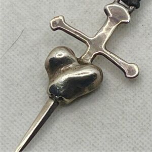 ISO, Robert Lee Morris sterling silver dagger through heart pendant